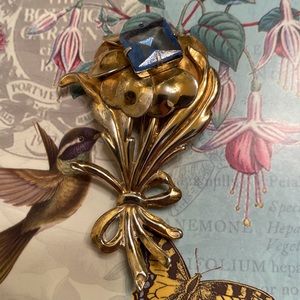 Vintage Sterling with Vermeil flower brooch square cut blue center rhinestone